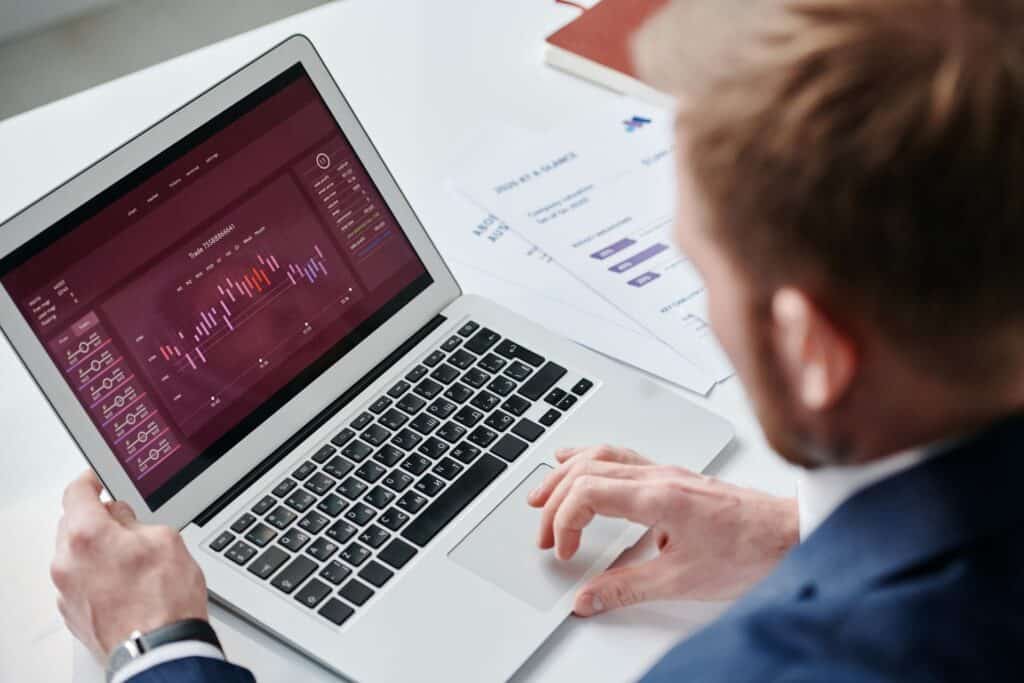 Clinic owner reviewing a Google Ads performance dashboard on a laptop